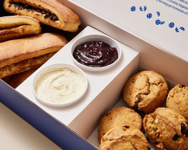 A Levain Bakery catering packaging display.